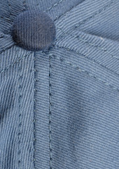 stitching and button detail on blue baseball hat