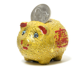 Funny yellow piggy bank