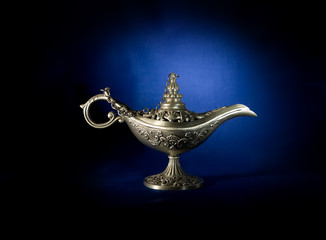 oriental silver coffeepot on the blue background