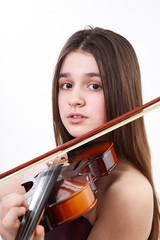 Portrait of the girl playing on a violin