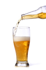 Beer being pour on a glass