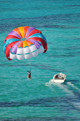 Fototapeta premium parasailing over the Caribbean ocean