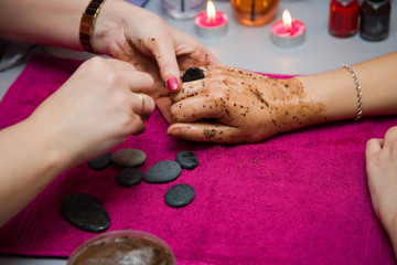 a manicure is in a  salon