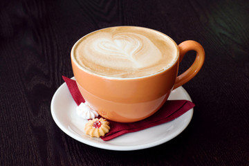 orange cup of coffe