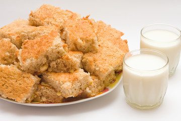 Fresh apple pie and milk. A home batch.
