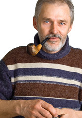 adult man with a pipe in a hand - 12917406