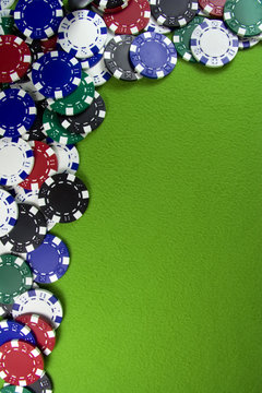 Many poker chips on casino table