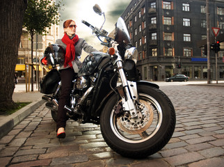 Beautiful woman on the motorcycle