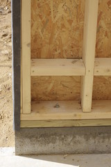 part of a wood house construction