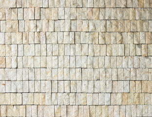 Fragment of rough gravel brick wall