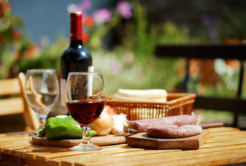 Table with delicious food and wine - 12942078