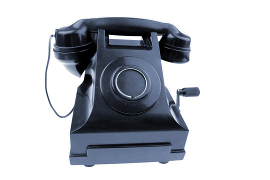 Antique telephone isolated on white background