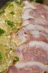 Chicken stuffed with pork meat with gelatin decoration