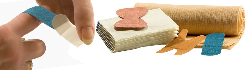 COVERING THE CUT WITH BANDAGE