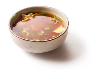 Miso soup with green onion in small dish