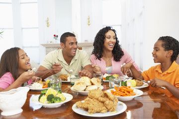 Obraz na płótnie Canvas Family Having A Meal Together At Home
