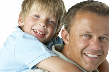 Father And Son Smiling