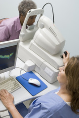 Nurse Checking Patient's Eyes