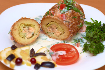 Cutlet with cabbage and salmon inside