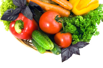 Still-life with fresh vegetables on a white background