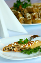 Pancake with fried mushroom