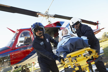 Paramedics unloading patient from Medevac © Monkey Business