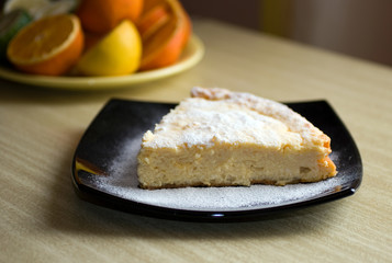 Cottage cheese cake on black plate