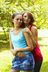 Obraz premium two beautiful girls in park