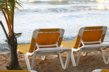 chaise longues on the beach