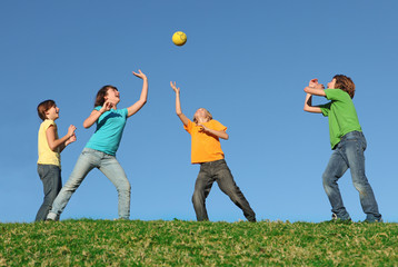 group of fit healthy active kids playing ball - 12981265