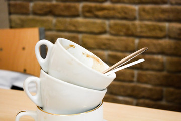 white cups with spoon