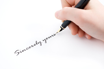 hand and fountain pen writting sincerely yours text