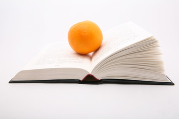 Orange in opened book