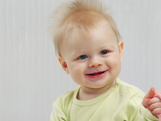 Fototapeta premium Bright closeup portrait of adorable baby.