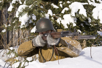 Soviet-Finnish war 1939-1940: Red Army soldier aims from a rifle