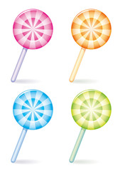 Set of four differently coloured striped candies