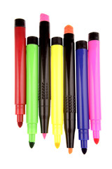 Colorful pens on white background