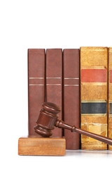 Wooden gavel and old law books