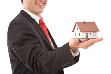 Businessman with house