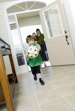 Happy Soccer Playing Arriving Home