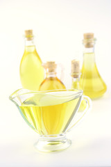 gold olive oil in different pots