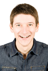 Obraz premium Closeup of a happy young man looking at camera