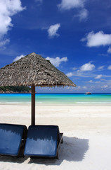 Chairs on a beautiful tropical island beach - 13015606