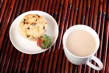 Cup Of Tea And Chocolate Chip Muffin