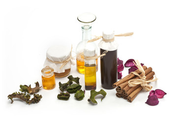 bottles of essential oil and cinnamon