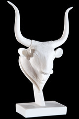 Classic white marble Cretan Bull's head isolated on black - obrazy, fototapety, plakaty