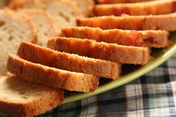 Fresh Vanilla cake with dried fruits on fabric background