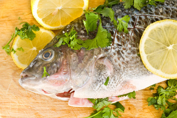 fresh fish on a wooden board