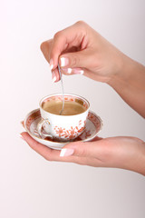 cup of coffe in hand