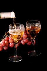 bunch of grapes and red wine